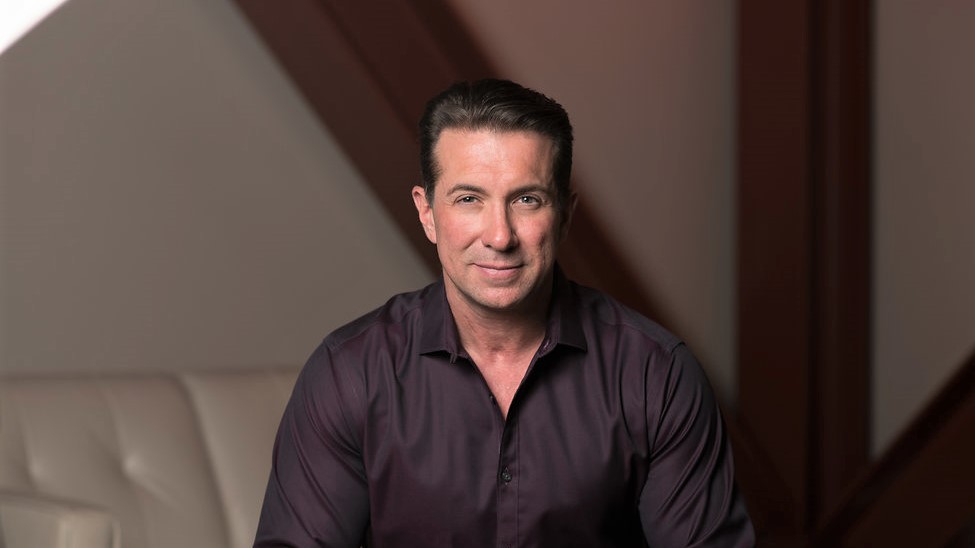 Brandon Frere portrait in a dark shirt